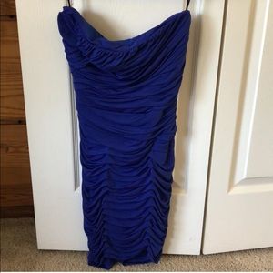 Short, form fitting blue dress